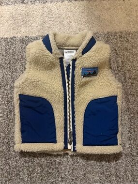 Patagonia Cream Sherpa Vest with Blue Pocket Accents